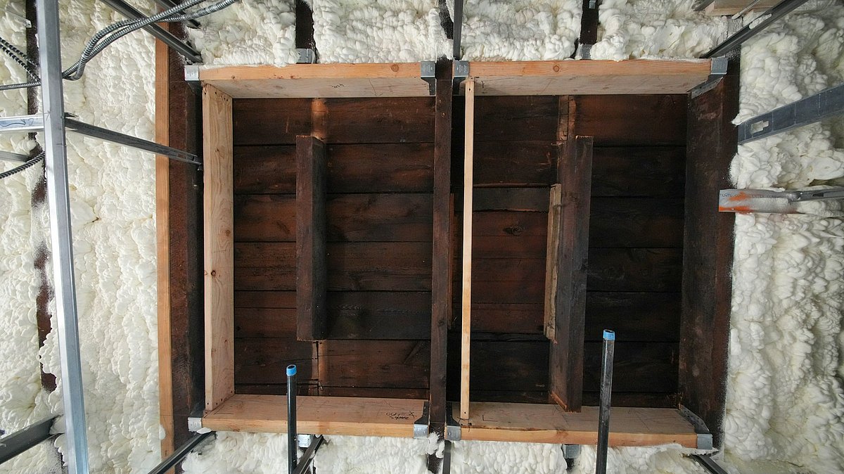 Ausschnitt eines Rohbaus mit gedämmten Wänden